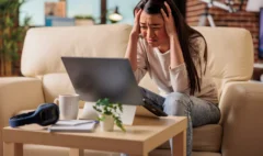 businesswoman-using-laptop-while-sitting-sofa-home (1)