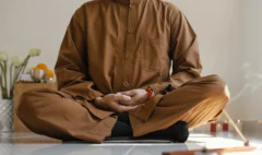 front-view-man-meditating-with-incense (1) (1)