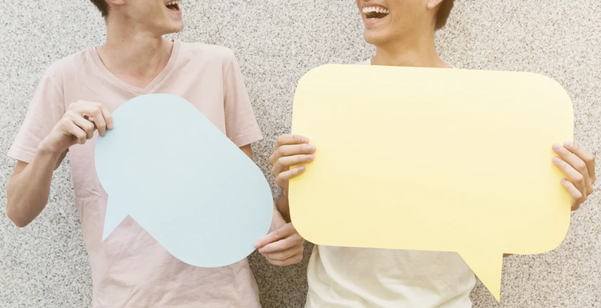 man-his-friends-holding-speech-bubbles