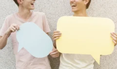 man-his-friends-holding-speech-bubbles